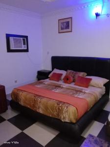 Llit o llits en una habitació de JCB Hotel
