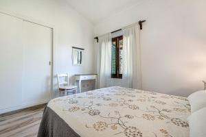 Postel nebo postele na pokoji v ubytování Villa Iris - Alcúdia
