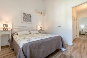 Postel nebo postele na pokoji v ubytování Villa Iris - Alcúdia