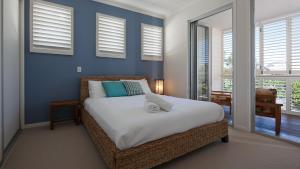 Postel nebo postele na pokoji v ubytování Seaside Beach House + 9 fotografií