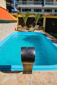 Bazén v ubytovaní Casa De Praia Sol e Mar alebo v jeho blízkosti
