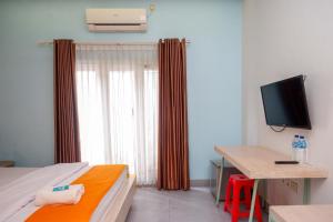 Gallery image of Sans Hotel Absari Yogyakarta in Durenan