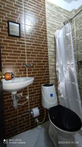 Koupelna v ubytování SANTYS HOUSE MELGAR apartamento amoblado para 6 personas + 18 fotografií