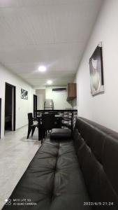 Posezení v ubytování SANTYS HOUSE MELGAR apartamento amoblado para 6 personas