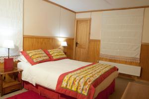 Una cama o camas en una habitación de Keoken Patagonia