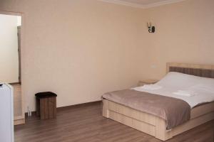 Postel nebo postele na pokoji v ubytování Spitak tun