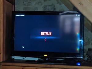 A television and/or entertainment centre at Rosalia Apartments