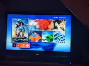 A television and/or entertainment centre at Rosalia Apartments