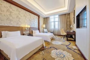 Μια τηλεόραση ή/και κέντρο ψυχαγωγίας στο Days Hotel by Wyndham Logan City Huizhou