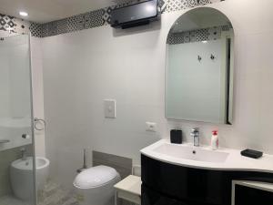 Ein Badezimmer in der Unterkunft E-Noa Holiday Home