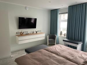 Postel nebo postele na pokoji v ubytování Ferienwohnung Silberzeit + 18 fotografií
