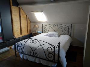 מיטה או מיטות בחדר ב-B&B De Hulst