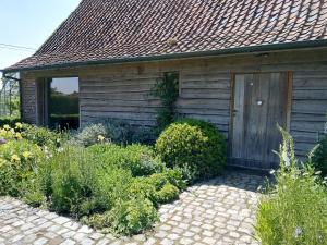 Ein Garten an der Unterkunft B&B De Hulst