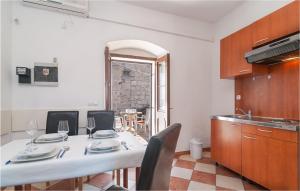 Kuchyň nebo kuchyňský kout v ubytování Apartment Soline Bb I