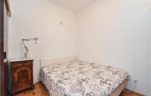 Postel nebo postele na pokoji v ubytování Apartment Soline Bb I