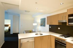 Una cocina o kitchenette en APX World Square