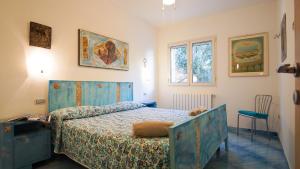 A bed or beds in a room at Sea View - Rena Bianca
