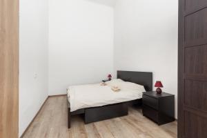 Posteľ alebo postele v izbe v ubytovaní D78 Dohány Apartment
