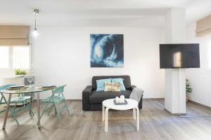 A television and/or entertainment centre at Loft Santa Lucia Centro