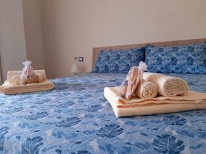 Postel nebo postele na pokoji v ubytování B&B Vigna Grande