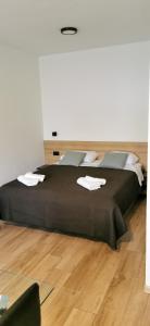 Postel nebo postele na pokoji v ubytování Casa Grzina
