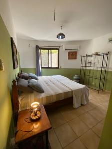 Ένα ή περισσότερα κρεβάτια σε δωμάτιο στο Villa met privé zwembad in Résidence Safari Village