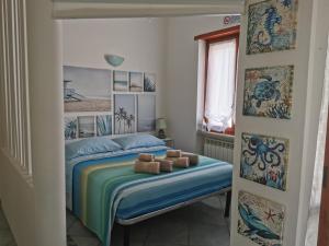 Ένα ή περισσότερα κρεβάτια σε δωμάτιο στο Beach Apartments in Montesilvano