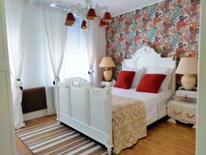Giường trong phòng chung tại Maison de 3 chambres avec jardin clos et wifi a Lens