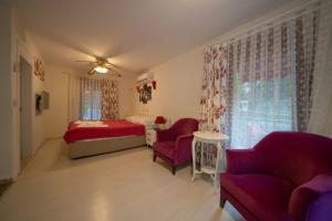 Postel nebo postele na pokoji v ubytování Zümrüt Çıralı Boutique Hotel