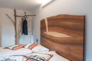 Postel nebo postele na pokoji v ubytování Hotel Wasserfall