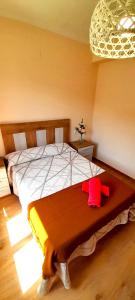 Łóżko lub łóżka w pokoju w obiekcie Apartamento Rural Playa Foz - VISTAS AL MAR