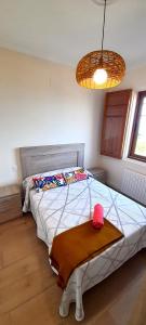 Łóżko lub łóżka w pokoju w obiekcie Apartamento Rural Playa Foz - VISTAS AL MAR