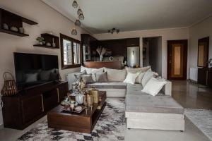 Predel za sedenje v nastanitvi Luxury Sweet Home