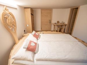 Postel nebo postele na pokoji v ubytování Hotel Wasserfall