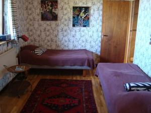 Postel nebo postele na pokoji v ubytování Guest cottege