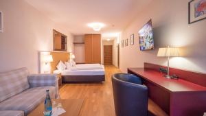 Postel nebo postele na pokoji v ubytování Hotel Malerhaus