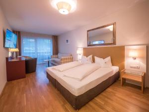 Postel nebo postele na pokoji v ubytování Hotel Malerhaus