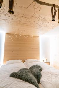 Postel nebo postele na pokoji v ubytování Hotel Wasserfall