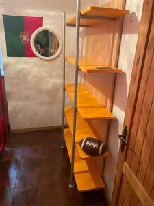 Palanda nebo palandy na pokoji v ubytování Carmela e Gennaro casa vacanze