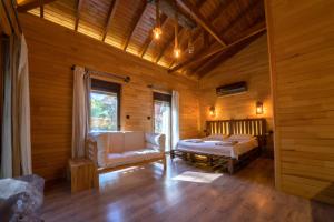Postel nebo postele na pokoji v ubytování Zümrüt Çıralı Boutique Hotel
