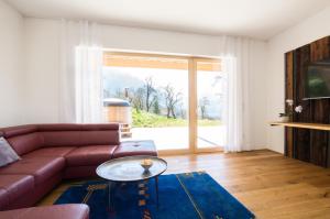 TV a/nebo společenská místnost v ubytování Attersee-Chalet Angermann Familie Spalt
