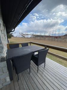 Ein Balkon oder eine Terrasse in der Unterkunft Himos Mökki