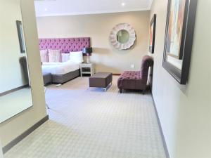 Ένα ή περισσότερα κρεβάτια σε δωμάτιο στο St Andrews Hotel and Spa