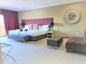 Ένα ή περισσότερα κρεβάτια σε δωμάτιο στο St Andrews Hotel and Spa