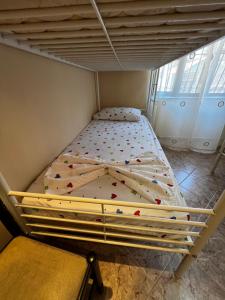 Uma ou mais camas em beliche num quarto em Grand Veranda Apartment