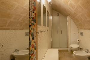 Koupelna v ubytování Dimora 1919 Luxury Loft + 37 fotografií