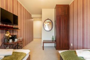 Posteľ alebo postele v izbe v ubytovaní Hotel Plumlov
