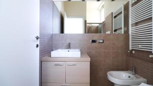 a bathroom with a sink and a mirror at Italianway - Ruffini 20 in Santa Margherita Ligure +25 photos