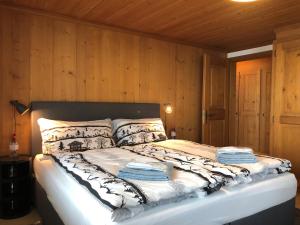 Posteľ alebo postele v izbe v ubytovaní Chalet Acadia