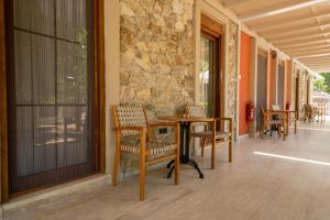 Balkón nebo terasa v ubytování Zümrüt Çıralı Boutique Hotel